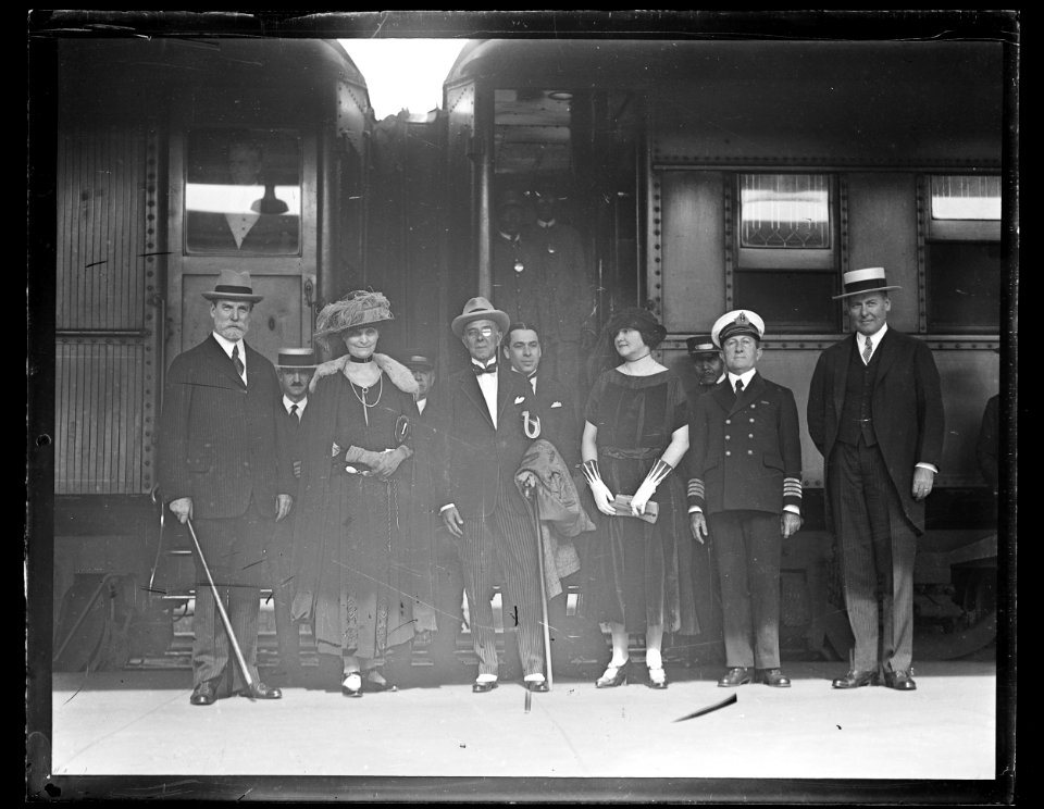 Group at train- Charles Evans Hughes and wife at left LCCN2016891632