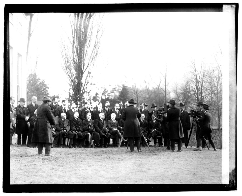 Group newspaper men at White House LOC npcc.03474