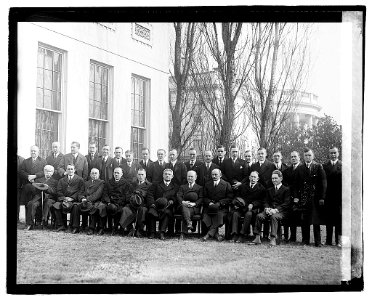 Group newspaper men at White House LOC npcc.03473