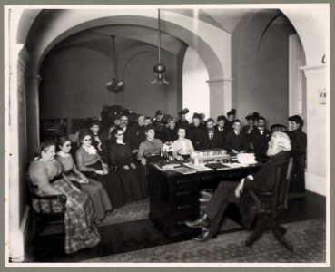 Group of blind people in reading room, ground floor, NE corner of Jefferson Building LCCN2010655000