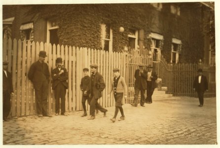 Group of boys who were suspicious and refused to give name. But some of the names were obtained from other boys. Peter Horency, County St., at left of picture. He is 14 according to Birth LOC nclc.02242 photo
