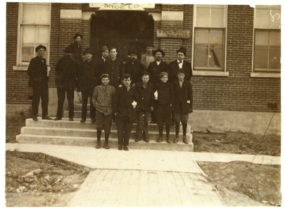 Group of boys working in Friedman Shelby Shoe Co., 6-30 A.M. The youngest, Vehnie Hughes, said he was 12 years old and had been working one year. Others are Hobson Waters, Elmer Behan, Ora LOC nclc.04700