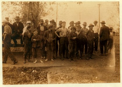 Group of boys, Merrimac Mills, noon-hour. They would not tell me the truth about their ages. LOC nclc.01903