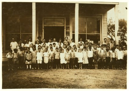 Group of children attending the mill school at Barker Cotton Mills. These children are well-kept at home, and well-directed in school. School is sanitary and well-equipped. School attendance LOC nclc.02917 photo