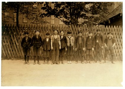 Group of boys who work in Suncock (N. H.) Mills. It is a large corporation, employing 1200 hands, but in all the three mills, I found only 1 girl and three boys that seemed to be under 14. LOC nclc.01744 photo