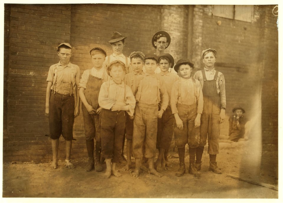 Group of doffers working in Pell City Cotton Mill arranged by the Overseer. Superintendent of the mill is also Mayor of Pell City. LOC nclc.01921