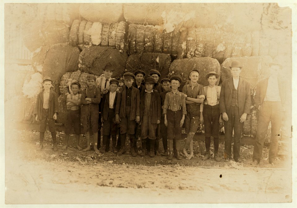 Group of boys working in Lancaster S.C. Cotton mills. Smallest boy said he had worked in the mill off and on for five years. Spins now. LOC nclc.01429