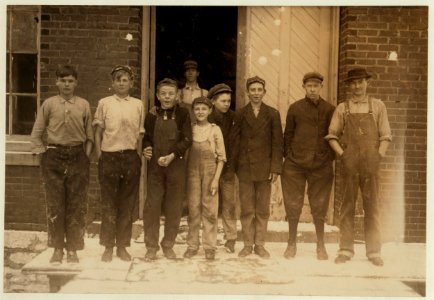 Group of boys working in Richmond Spinning Mill, East Lake. Street Bretzau, with bandaged finger, in centre. LOC nclc.01973