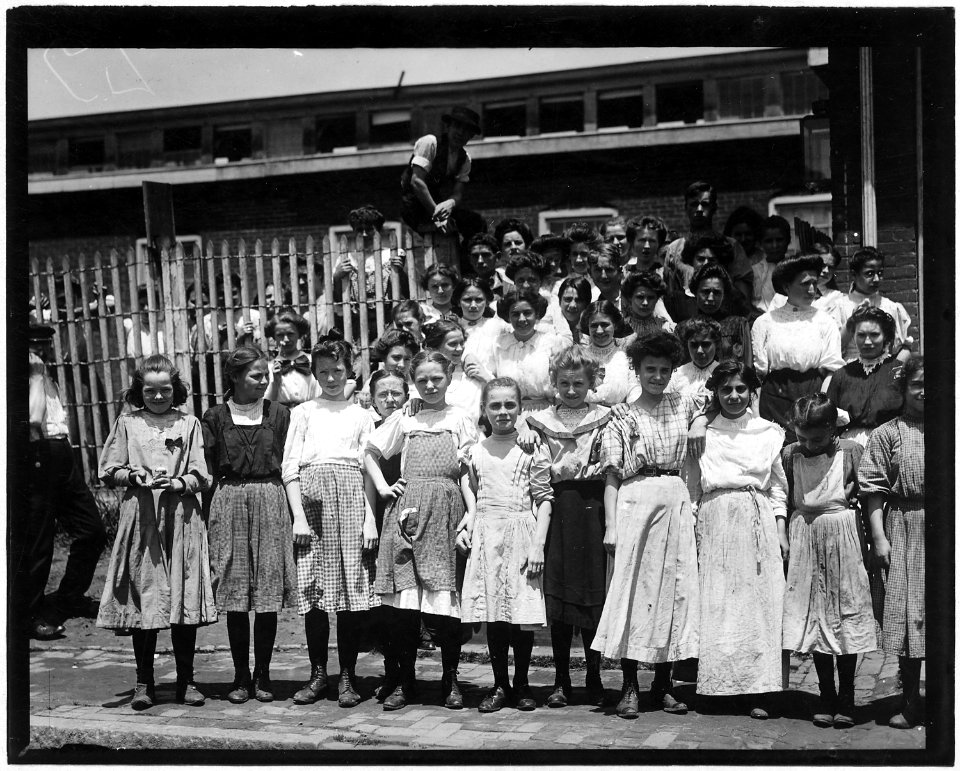 Group of girl workers at the gate of the American Tobacco Co. Young girls obviously under 14 years of age, who work... - NARA - 523314