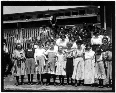 Group of girl workers at the gate of the American Tobacco Co. Young girls obviously under 14 years of age, who work... - NARA - 523314