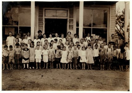 Group of children attending the mill school at Barker Cotton Mills. These children are well-kept at home, and well-directed in school. School is sanitary and well-equipped. School attendance LOC cph.3c30785 photo