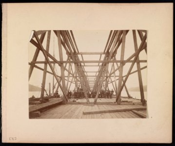 Group of men in suits standing on the Hawkesbury Bridge, New South Wales, Australia LCCN2016652518