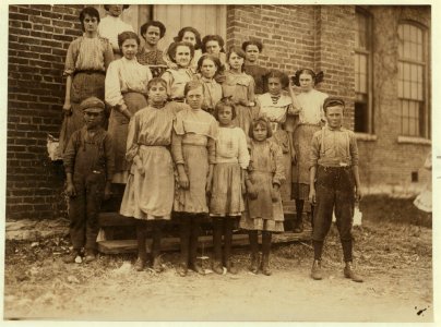 Group of spinners in Elk Cotton Mills. Youngest girl hardly knew her name. Youngest boy runs two sides at ten cents each a day. LOC nclc.01899