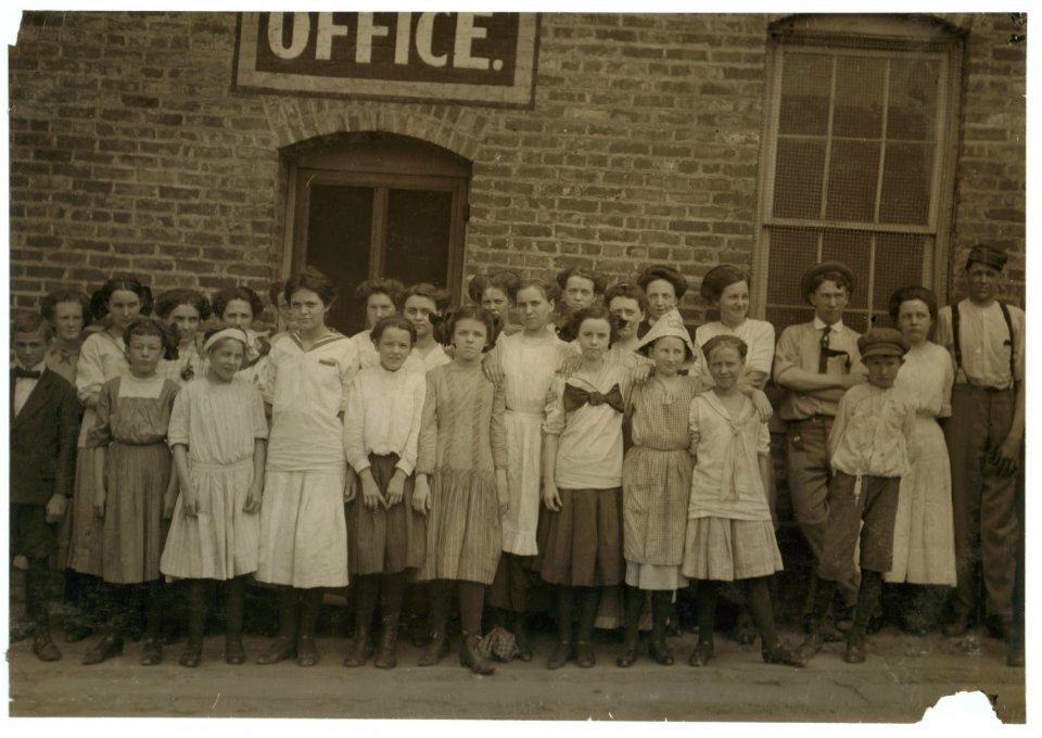 Group of workers in Danville, (Va.) Knitting Works, Only a few of them would pose. I watched them going to and coming from work; also went through the factory during working hours. One LOC cph.3b05703