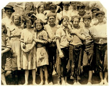 Group of workers in Meritas Mill, Columbus, Ga. Could not get the youngest. I went through the mill in the morning and saw some very young workers, and a number of little dinner-toters who LOC nclc.02827
