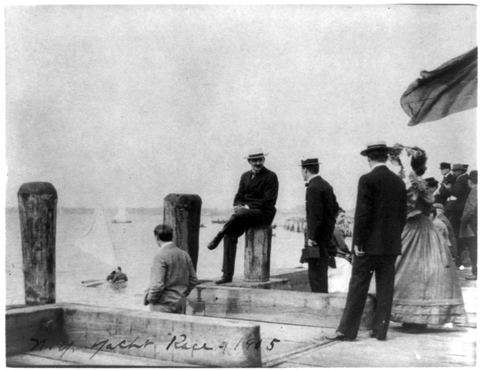 Group of well-dressed people on dock during yacht race, Oyster Bay, Long Island, N.Y. LCCN89711948