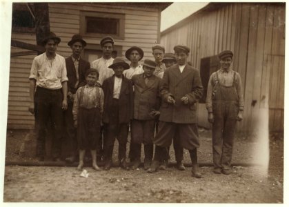 Group of workers in Avondale Mills. Smallest boy is John Tidwell, been doffing 3 months. Boy next to him is Ragin Bryant been doffing here for five years. LOC nclc.01934