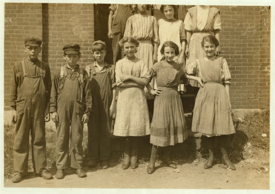 Group of Workers in Glenallen Mill, including Adrienne Pagnette, Annie Dugas, Francis Pagnette, Anatole Gernon, apparently 11 or 12 years old, doffs on top floor spinning room of the above LOC nclc.02318