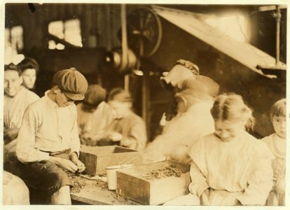 Group of workers stringing beans in J. S. Farrand Packing Company, Baltimore, Md. Many youngsters work here. Photo July 7, 1909. LOC cph.3b45099