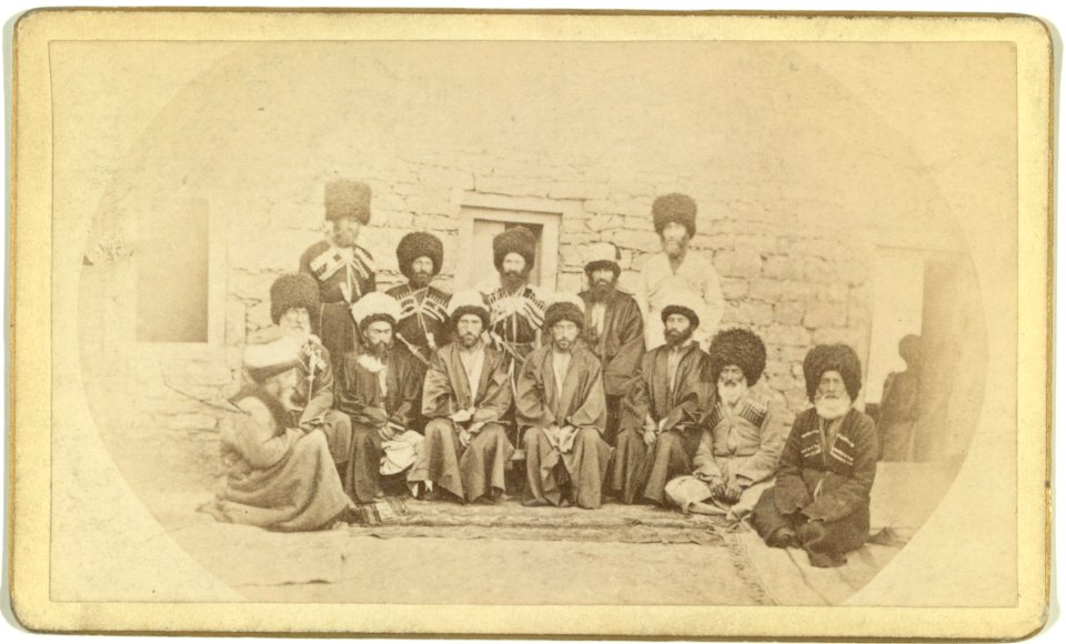Group portrait of men from Transcaucasus region posed in front of building LCCN99615612
