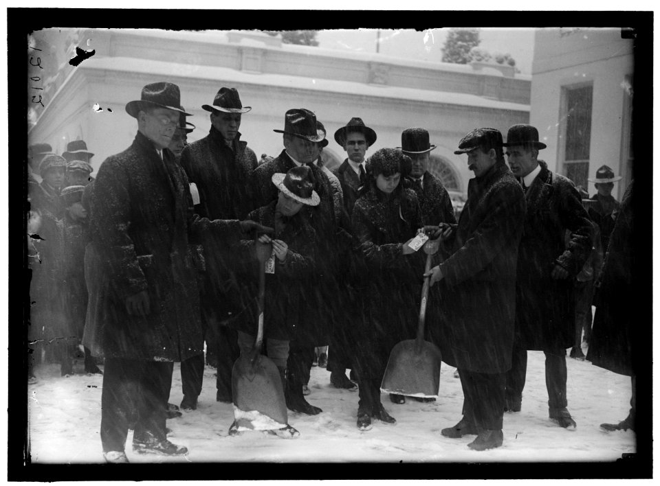 Group outside White House in snow LOC hec.10308
