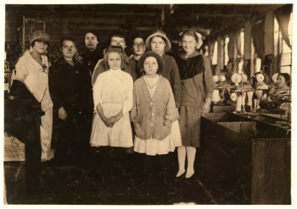 Group showing some of the youngest workers taken in the Scotland Neck Cotton Mill at starting time. Tiniest girl, one apparently 8 or 9, investigator saw at work at her knitting machine LOC nclc.02962