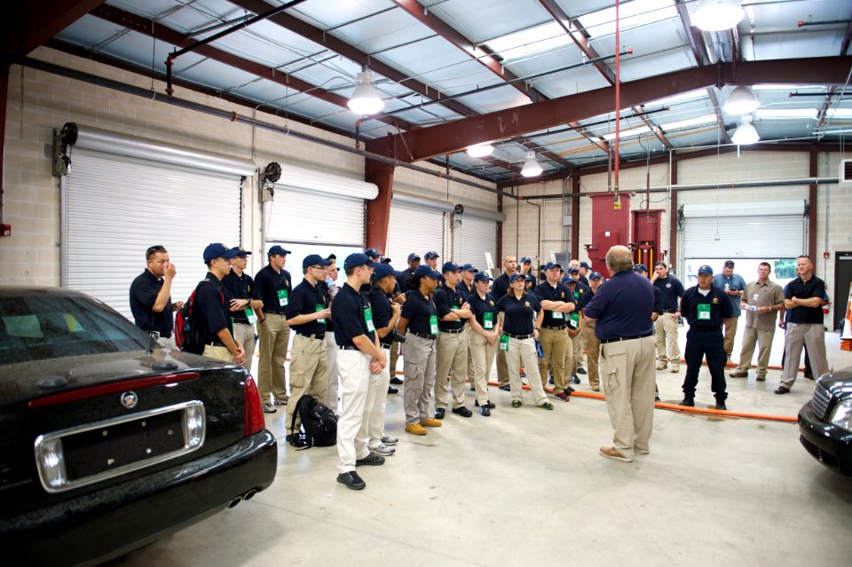 Group talk for law enforcement explorers in garage