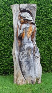 Sculptor wood girl photo