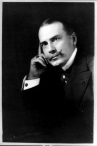 Frederic Courtland Penfield, half-length portrait, facing left, right hand resting on face LCCN89707163