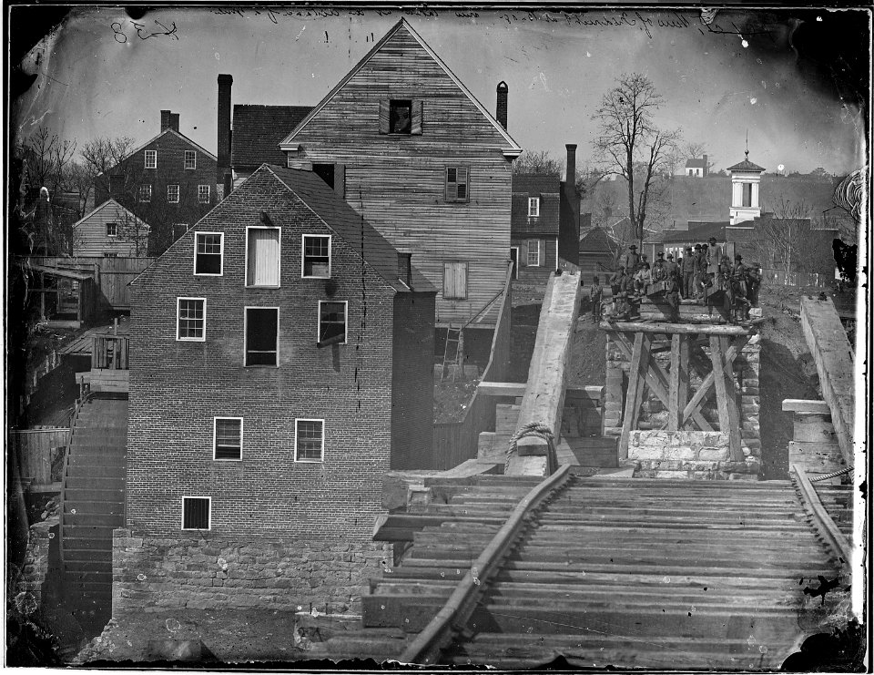Fredericksburg from the river. Showing Confederate troops and bridge. (taken at a distance of one mile.) - NARA - 524858