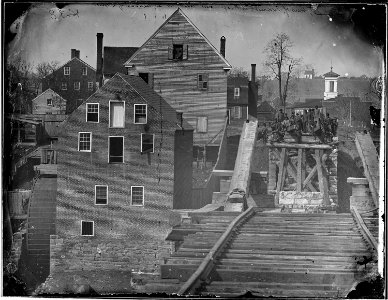 Fredericksburg from the river. Showing Confederate troops and bridge. (taken at a distance of one mile.) - NARA - 524858