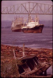Freighters-coming-into-dock-at-rainier-oregon-on-the-columbia-river-old-lumbermans-shack-uprooted-by-wind-and-weather-seems-ready-to-slide-into-log-boom-041973 4272330126 o