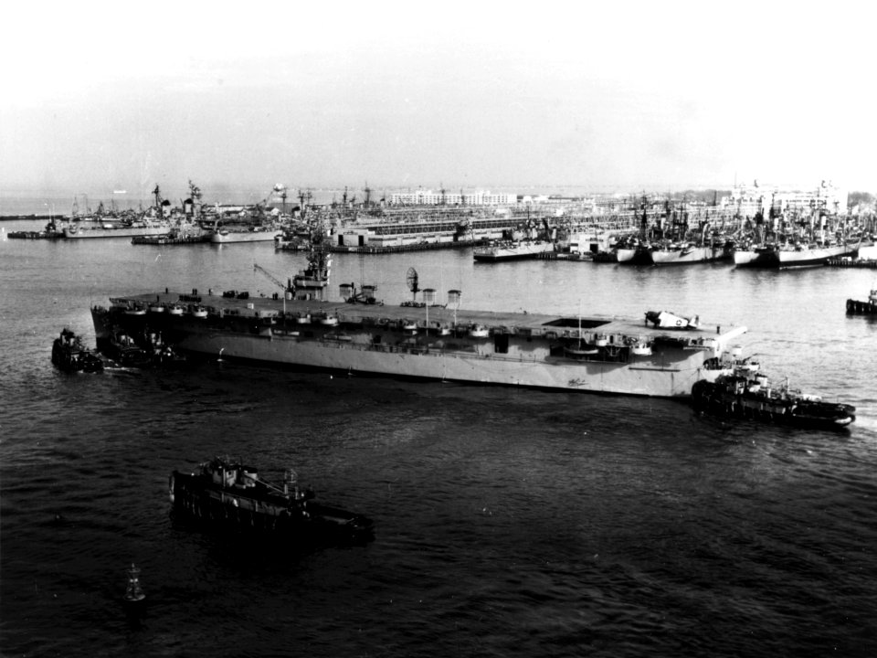 French aircraft carrier Bois Belleau (R97) at Naval Station Norfolk, in December 1953 (NH 89299)