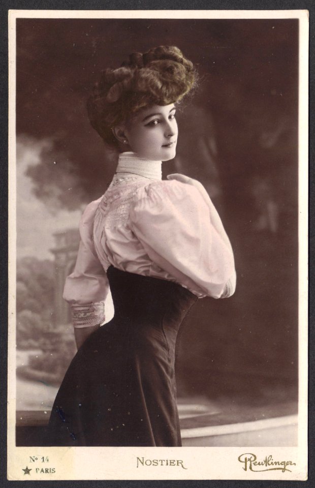 French Actress Mlle. Nostier, in Swan-Bill Corset and Mutton Chop Sleeves, circa 1905, verso