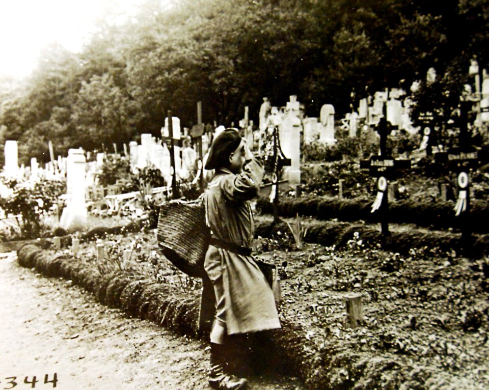 French boy saluting the grave of a French hero, St. Mihiel, Meuse, France, 1918 (32832949391)