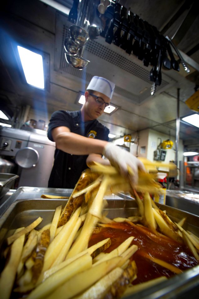 French fries being prepared on board the USS Monterey (CG 61)