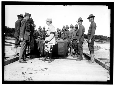 French Officers with group. US Army Engineering unit building a pontoon bridge at Washington Barracks, Washington, D.C. LOC hec.10895