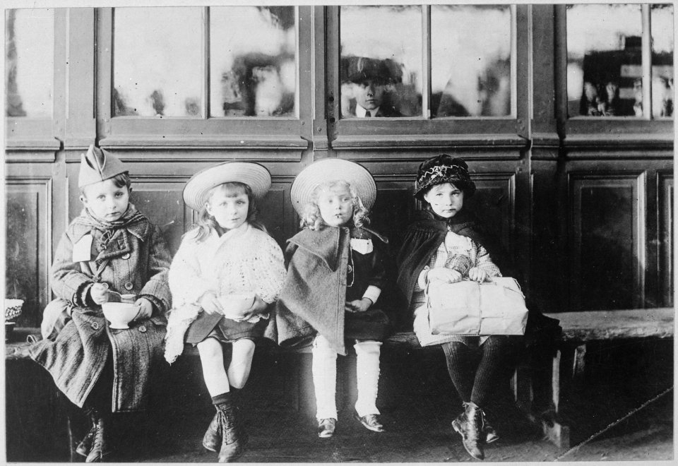French Refugee Children. While waiting for train, children were fed with bread and milk from American Red Cross... - NARA - 533652