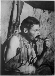 French soldier resting after battle. Underwood and Underwood., 1917 - 1919 - NARA - 533728
