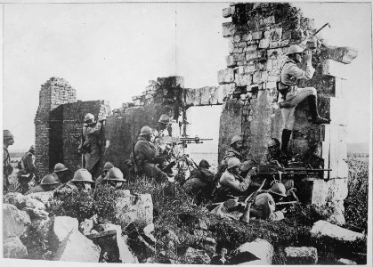 French troopers under General Gouraud, with their machine guns amongst the ruins of a cathedral near the Marne... - NARA - 533679 photo