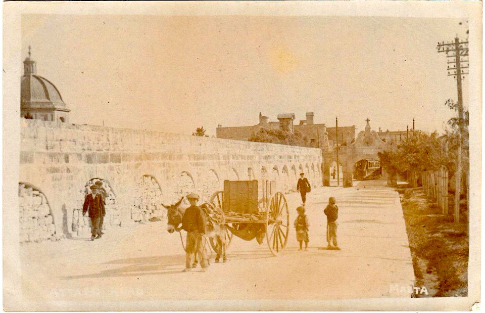 From the other side of Wignacourt arch Fleur-de-lys, Tram turning