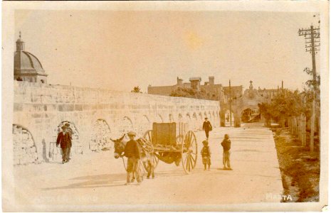 From the other side of Wignacourt arch Fleur-de-lys, Tram turning