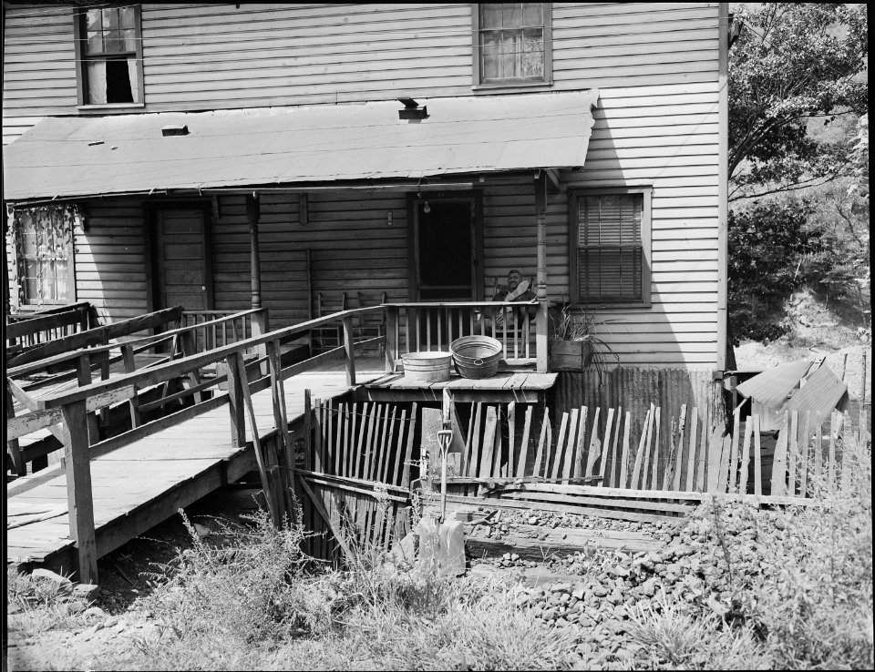 Front porch and runway to the home of Robert Harold and his wife. He built the runway. Southern Coal Corporation... - NARA - 541049