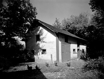 Front and Side Photograph of the Jean Baptiste Valle Barn in Ste Genevieve MO