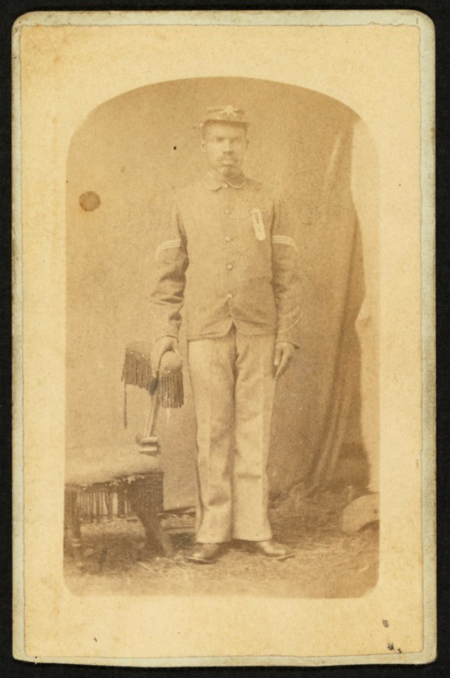 Full length portrait of an African-American man, possibly a Buffalo soldier) - Mosser & Snell, Traveling Photographic Art Gallery, Cantonment, Ind. Terr LCCN2010647774