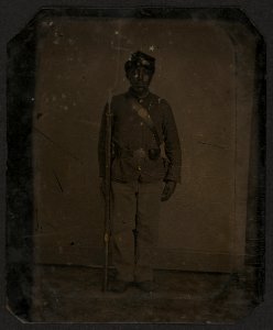 Full standing black soldier, rifle with fixed bayonet LCCN2010650831