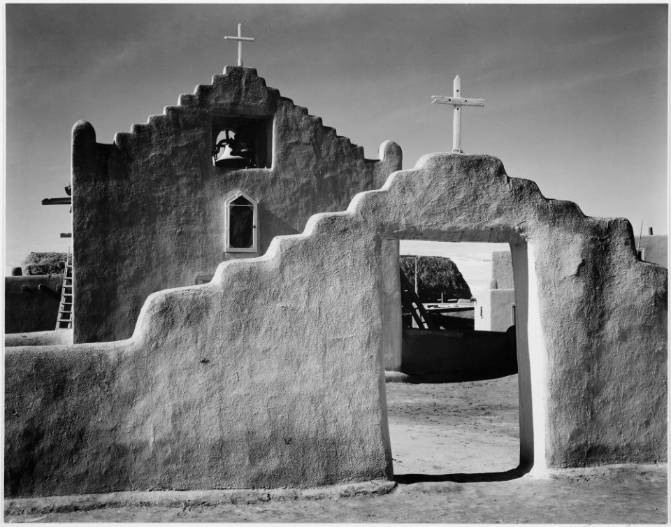Full side view of entrance with gate to the right, Church, Taos Pueblo National Historic Landmark, New Mexico, 1941. ( - NARA - 519985