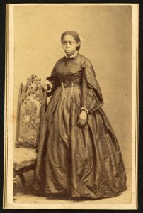 Full-length portrait of an unidentified African American woman, standing beside a chair) - photographed by William Abel, Flamington, N.J LCCN2010647809 photo