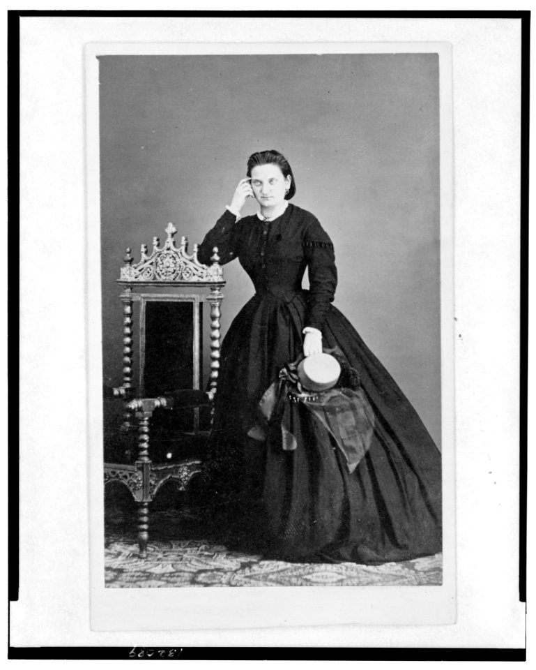 Full-length portrait of a woman, standing, facing front LCCN2005692476