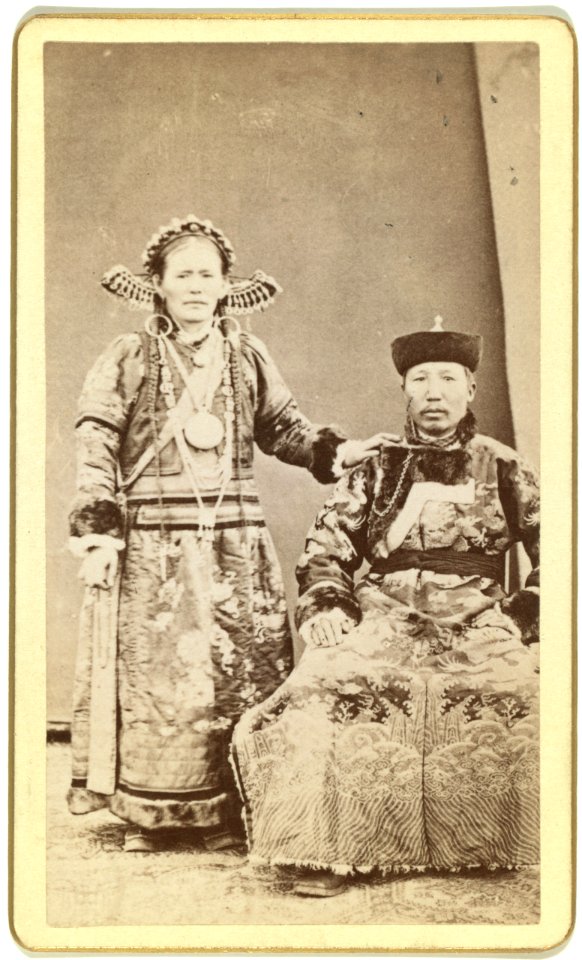 Full-length portrait of wealthy Buriat man and his wife, facing front LCCN99615628